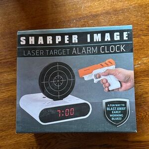Sharper Image Black and White Laser Target Clock with Orange Gun